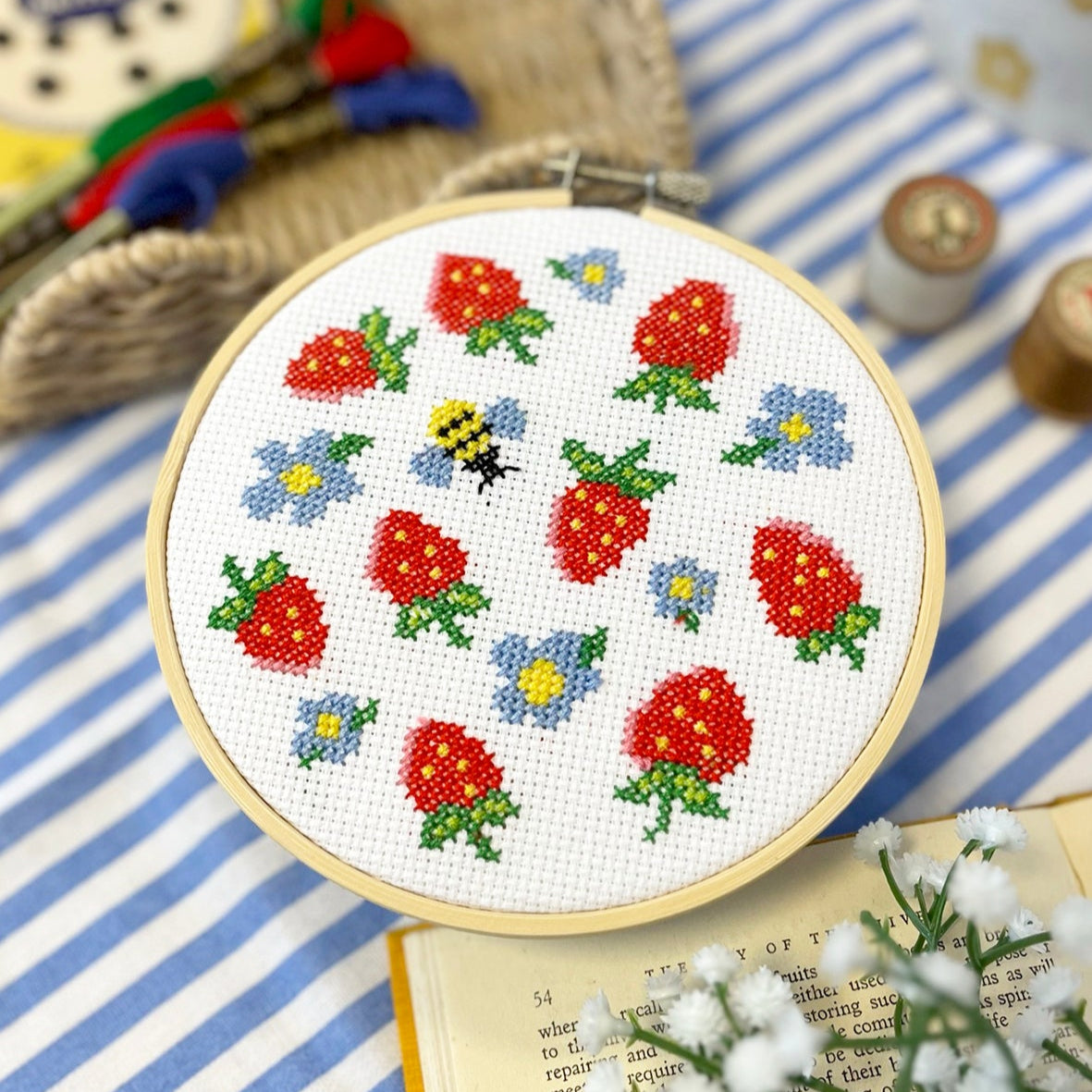 cross stitch kit with cute strawberry and bee design