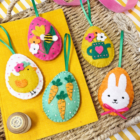 Set of five easter eggs with cute and colourful decorations