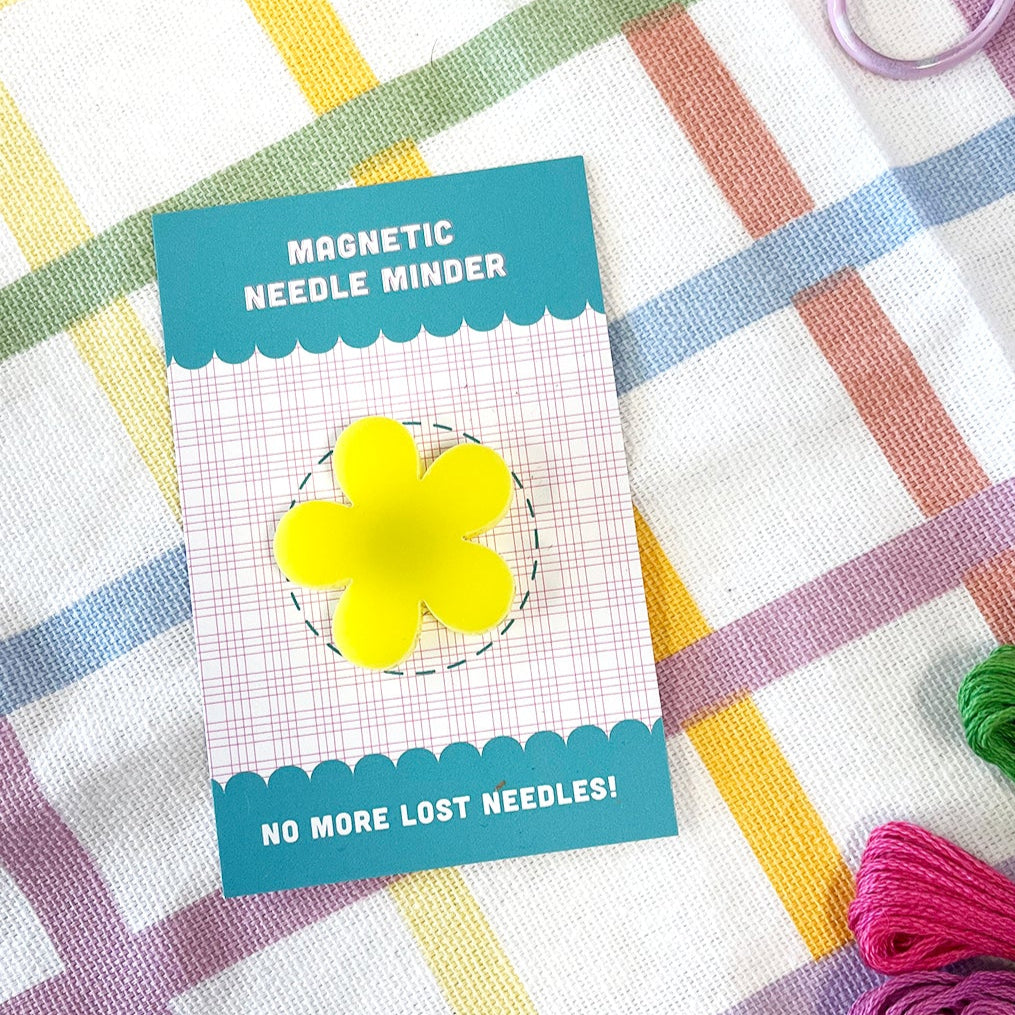 cute yellow daisy needle minder on a card